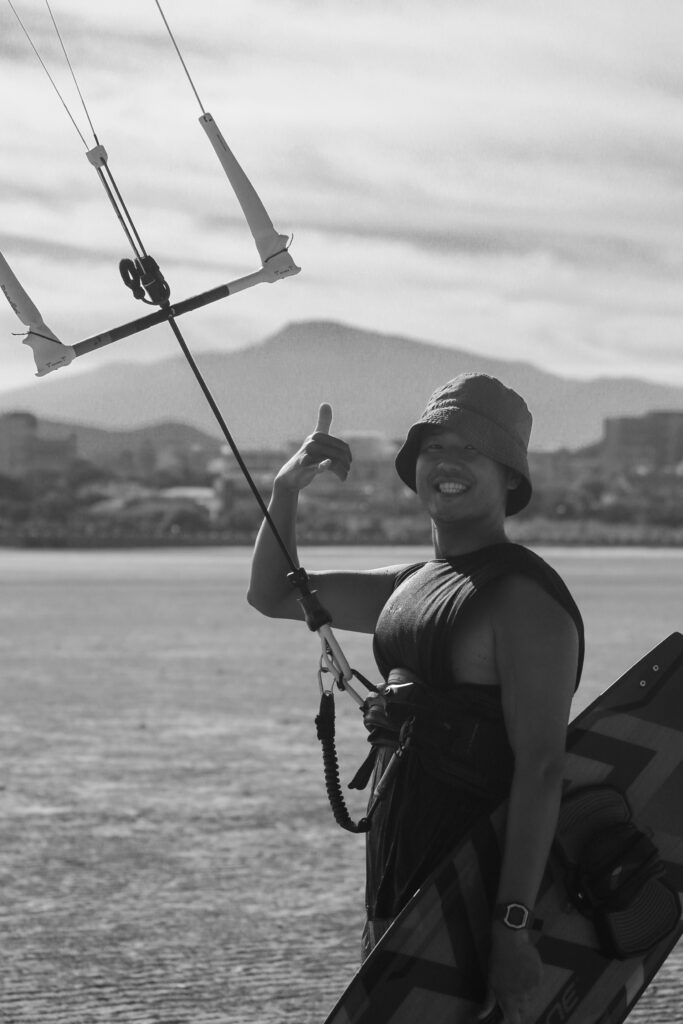 Jeju Kite Lab owner with kite equipment in front of hallasan in Jeju Island, Kitesurfing Jeju island South Korea